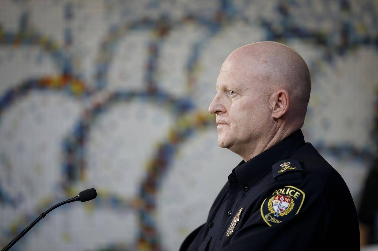 Ottawa interim police chief Steve Bell speaks to reporters during a press conference in Ottawa, Sunday, Feb. 20, 2022. Ottawa police promise a heavy presence in the capital and zero tolerance for hate as a second convoy prepares to descend on the city this weekend, this time involving hundreds of motorcycles instead of trucks. THE CANADIAN PRESS/Cole Burston