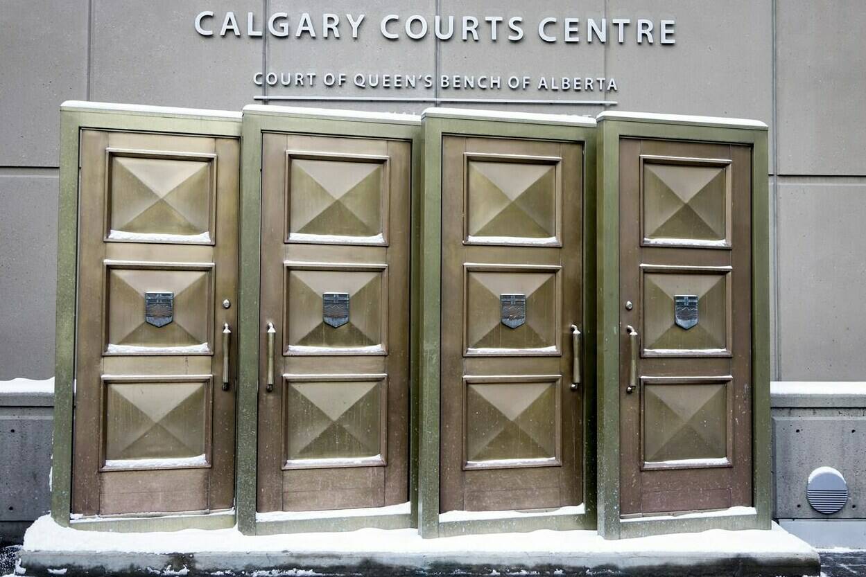 Doors from the original courthouse are used at the entrance to the new Calgary Courts Centre as seen on Friday, Jan. 18, 2019. A Calgary man has pleaded guilty to terrorism-related activities with the militant Islamic State. THE CANADIAN PRESS/Jeff McIntosh