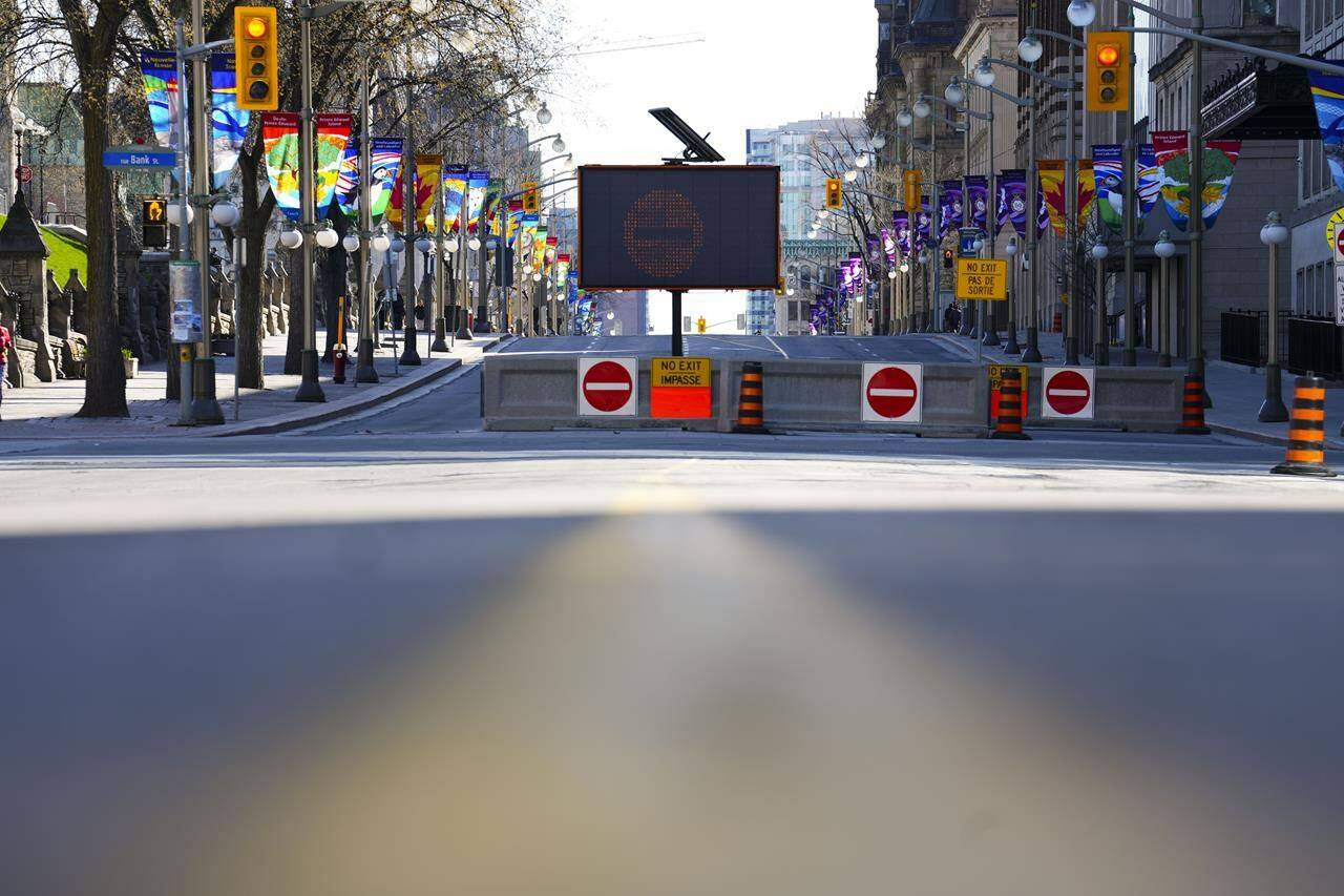 A traffic free Wellington Street is pictured prior to the start of a demonstration, part of a convoy-style protest participants are calling “Rolling Thunder”, in Ottawa, Saturday, April 30, 2022. THE CANADIAN PRESS/Sean Kilpatrick