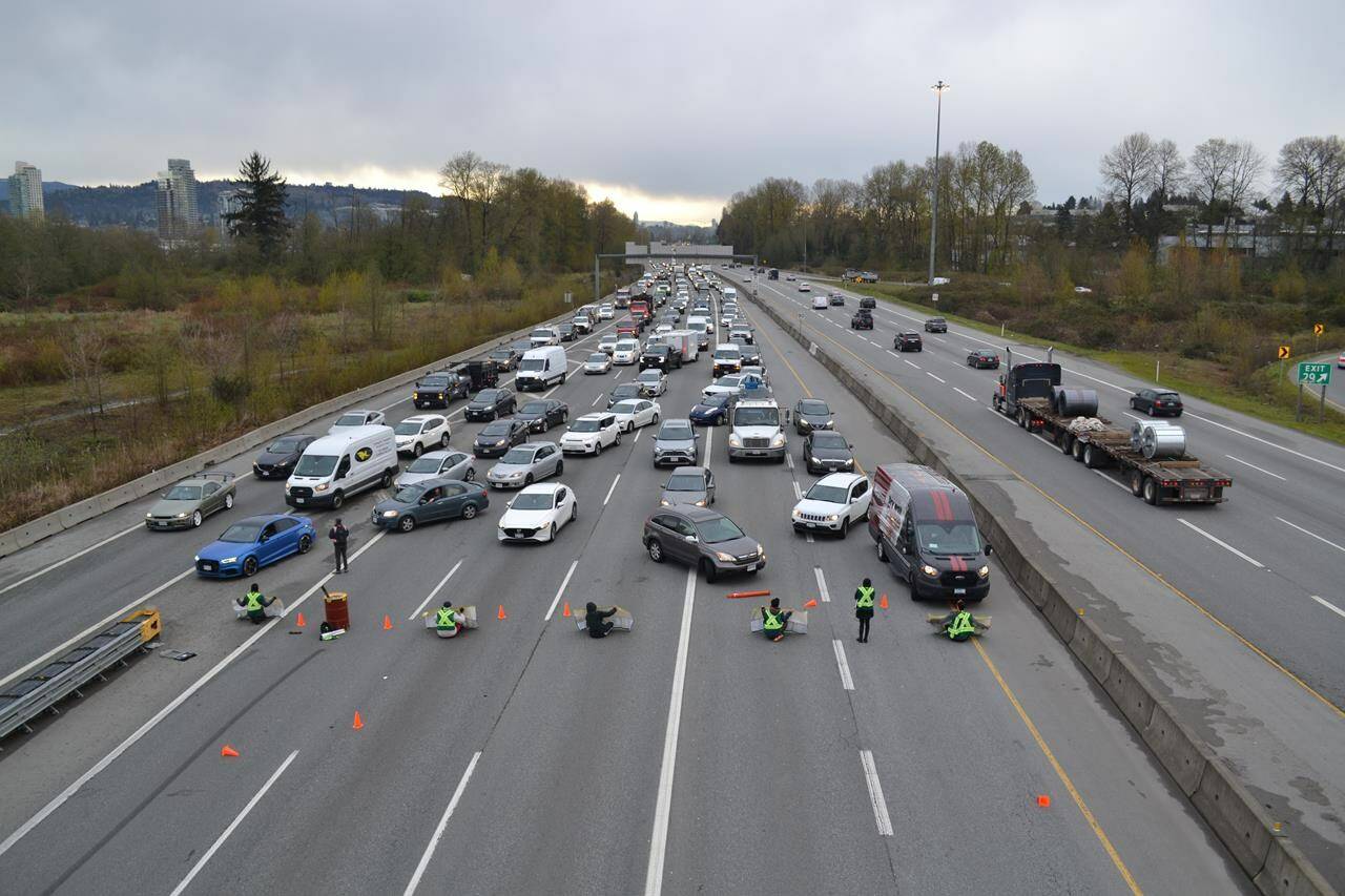 Activists with Save Old Growth block traffic on the Trans-Canada Highway in Metro Vancouver last month, calling for an end to old-growth logging in British Columbia. THE CANADIAN PRESS/HO-Save Old Growth *MANDATORY CREDIT*