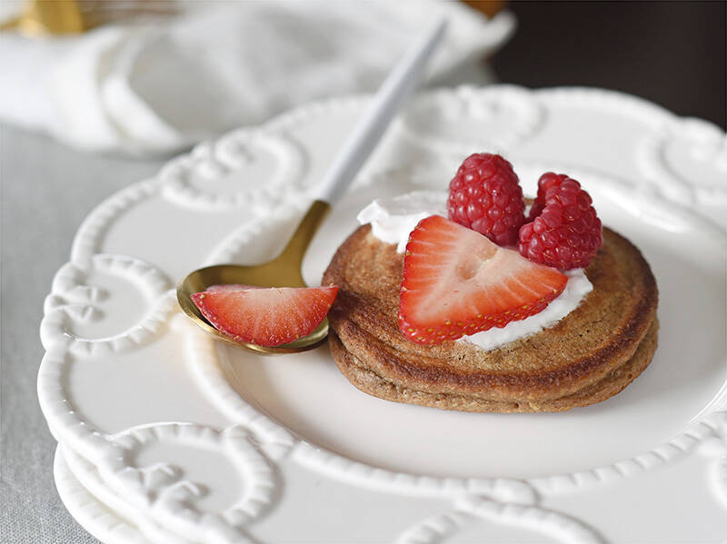 March 4, 2022 - Pancake with strawberry for brunch meal with Ellie Short. Don Denton photograph