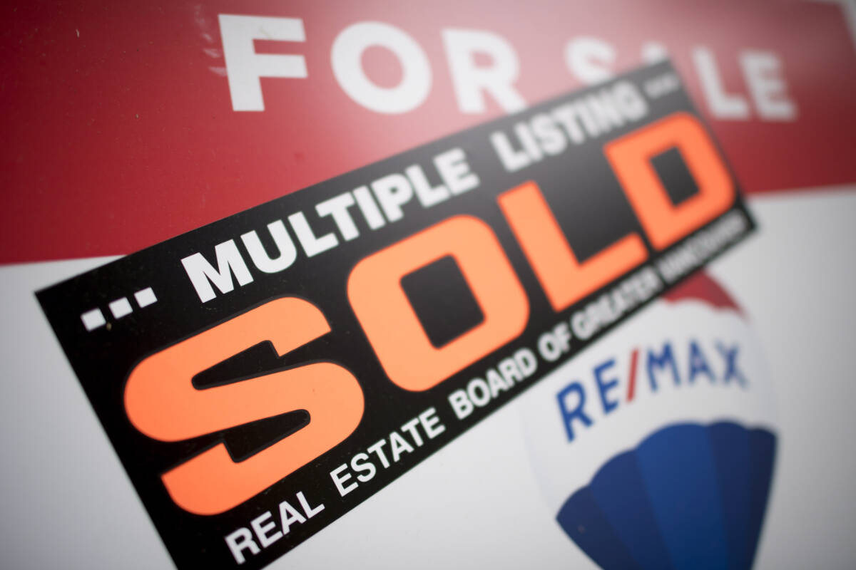 A real estate sign is pictured in Vancouver, B.C. THE CANADIAN PRESS Jonathan Hayward