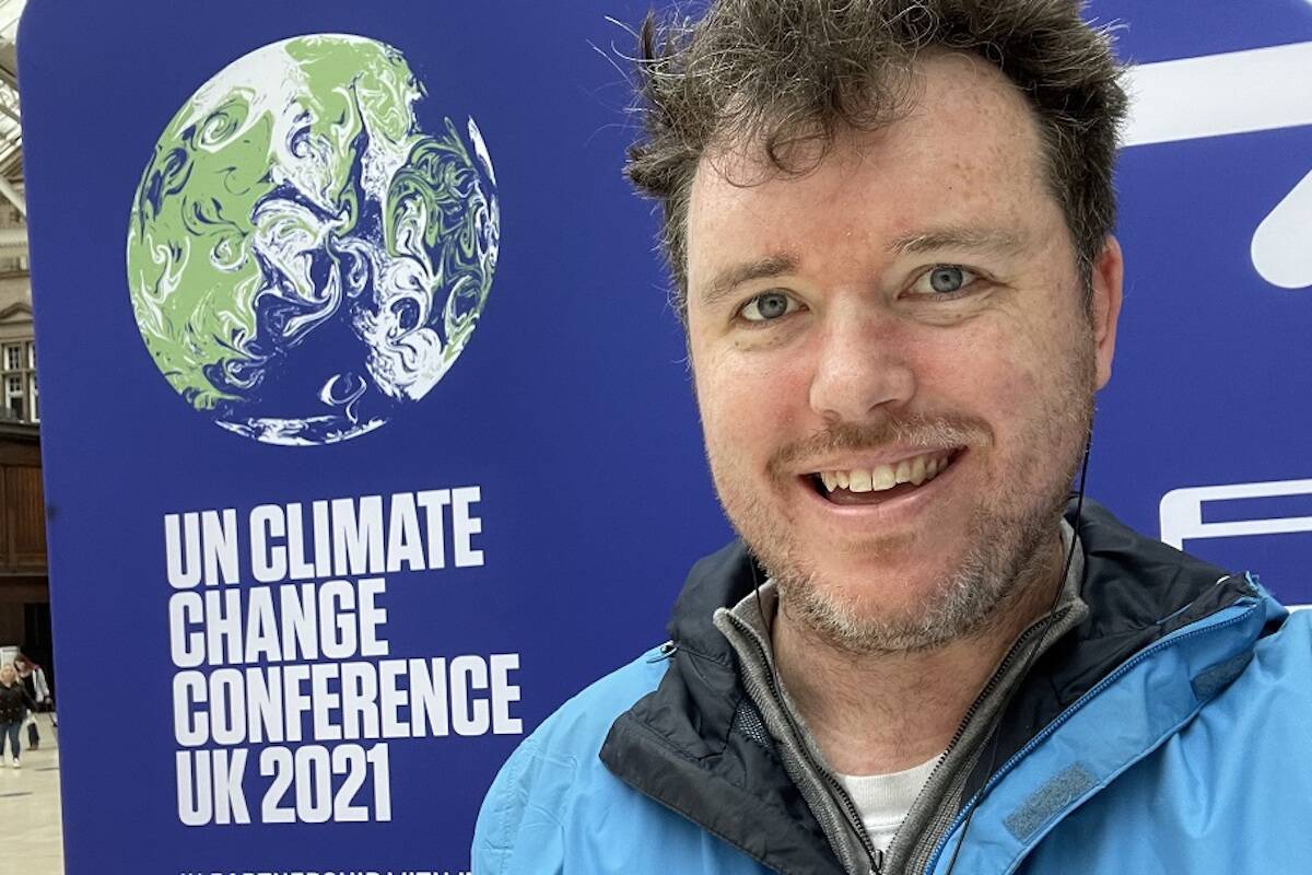 Economist and University of Victoria postdoctorate fellow Kevin Andrew was one of three authors of a study into green stimulus among G20 countries. He’s pictured here at a climate change conference in Glasgow. (Courtesy of Kevin Andrew)
