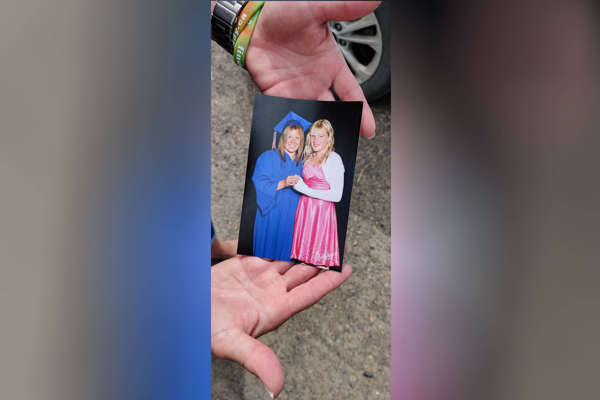 Dawn Scott shows a photo of her daughter Madison at her graduation. (Aman Parhar/Omineca Express)