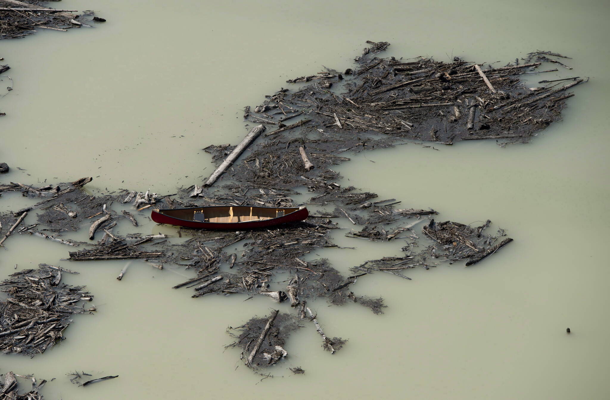 A aerial view shows the damage caused by a tailings pond breach on Lake Polley, B.C. Tuesday, August, 5, 2014. THE CANADIAN PRESS/Jonathan Hayward