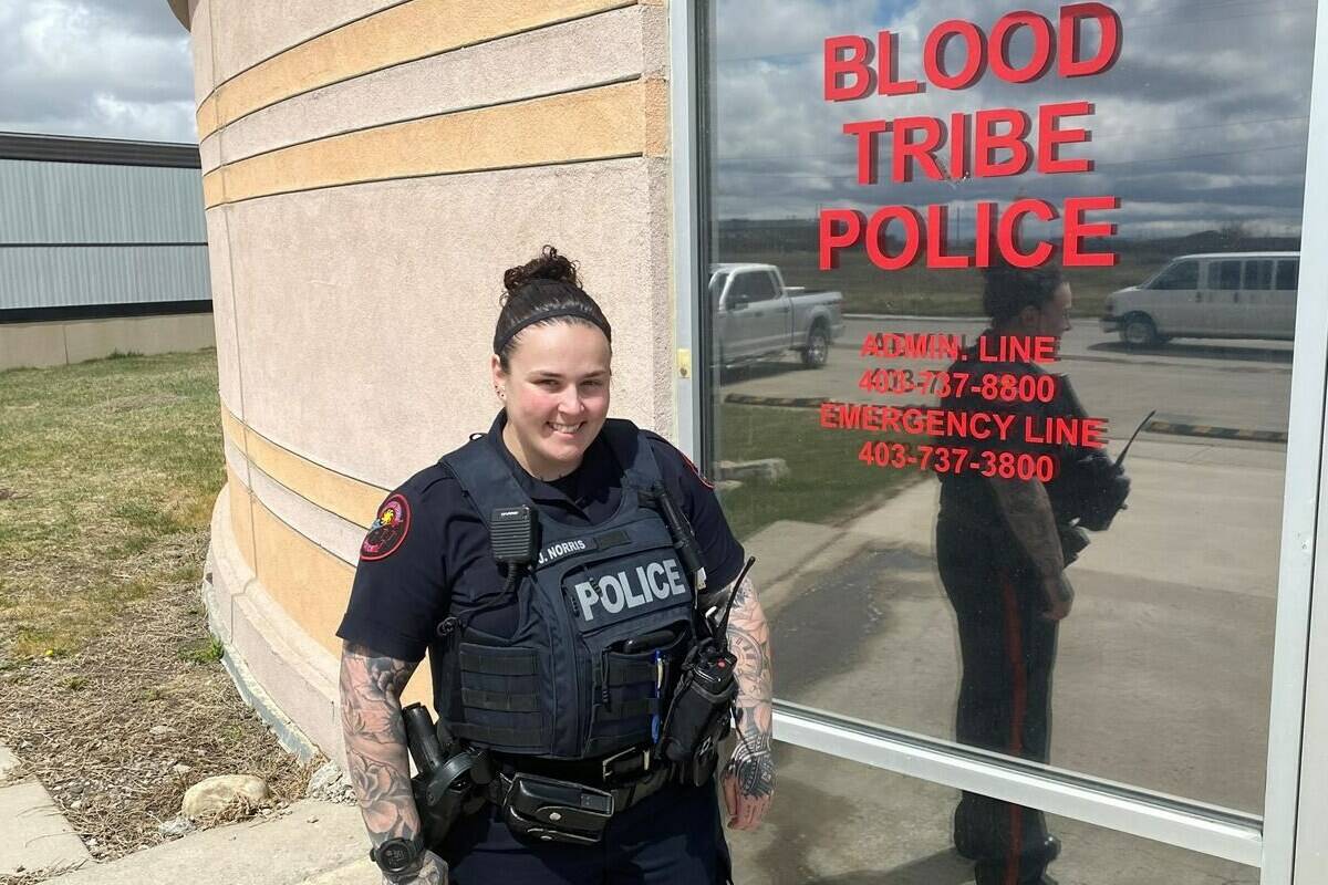 Senior Constable Jennaye Norris of the Blood Tribe Police poses in Standoff, Alta. on Monday, May 9, 2022. Norris is the human trafficking coordinator at the service. THE CANADIAN PRESS/Bill Graveland