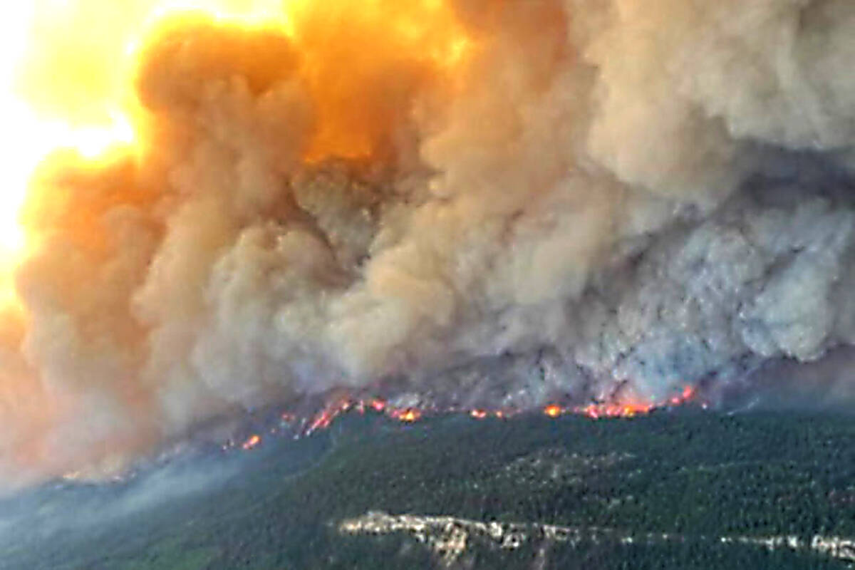The Sparks Lake wildfire shown on June 30, 2021. Beginning in 2022, the B.C. government will provide communities with at least $38,000 a year to fight climate change. (BC Wildfire Service photo)