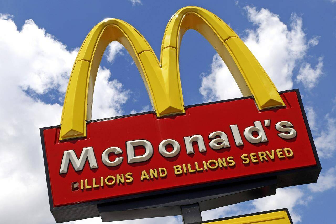 FILE - This June 25, 2019, photo shows the sign outside a McDonald’s restaurant in Pittsburgh. McDonald’s said higher U.S. menu prices and easing COVID restrictions elsewhere helped offset troubled markets like China and Russia in the first quarter. The Chicago-based burger giant said Thursday, April 28, 2022 its revenue rose 11% to $5.66 billion in the January-March period. (AP Photo/Gene J. Puskar, File)