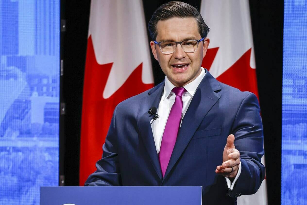 Candidate Pierre Poilievre makes a point at the Conservative Party of Canada English leadership debate in Edmonton, Alta., Wednesday, May 11, 2022. Poilievre is denouncing the "white replacement theory" that is believed to be a motive for a mass shooting in Buffalo, N.Y., over the weekend as "ugly and disgusting hate mongering." THE CANADIAN PRESS/Jeff McIntosh