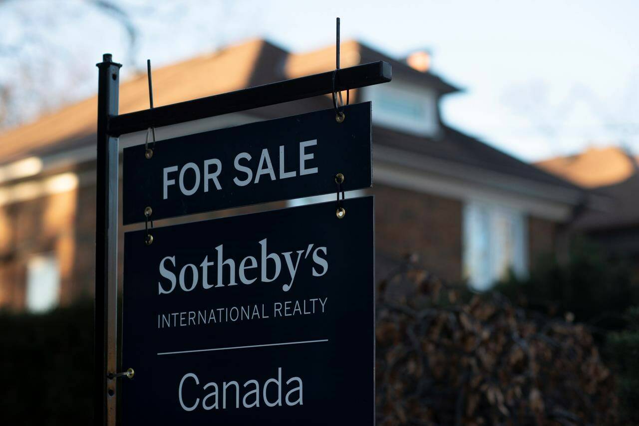 A real estate sale sign is shown in a west-end Toronto neighbourhood Saturday, March 7, 2020. A wave of buyer’s remorse is taking shape in several heated real estate markets, after housing prices started dropping and the number of sales slowed over the last two months. THE CANADIAN PRESS/Graeme Roy