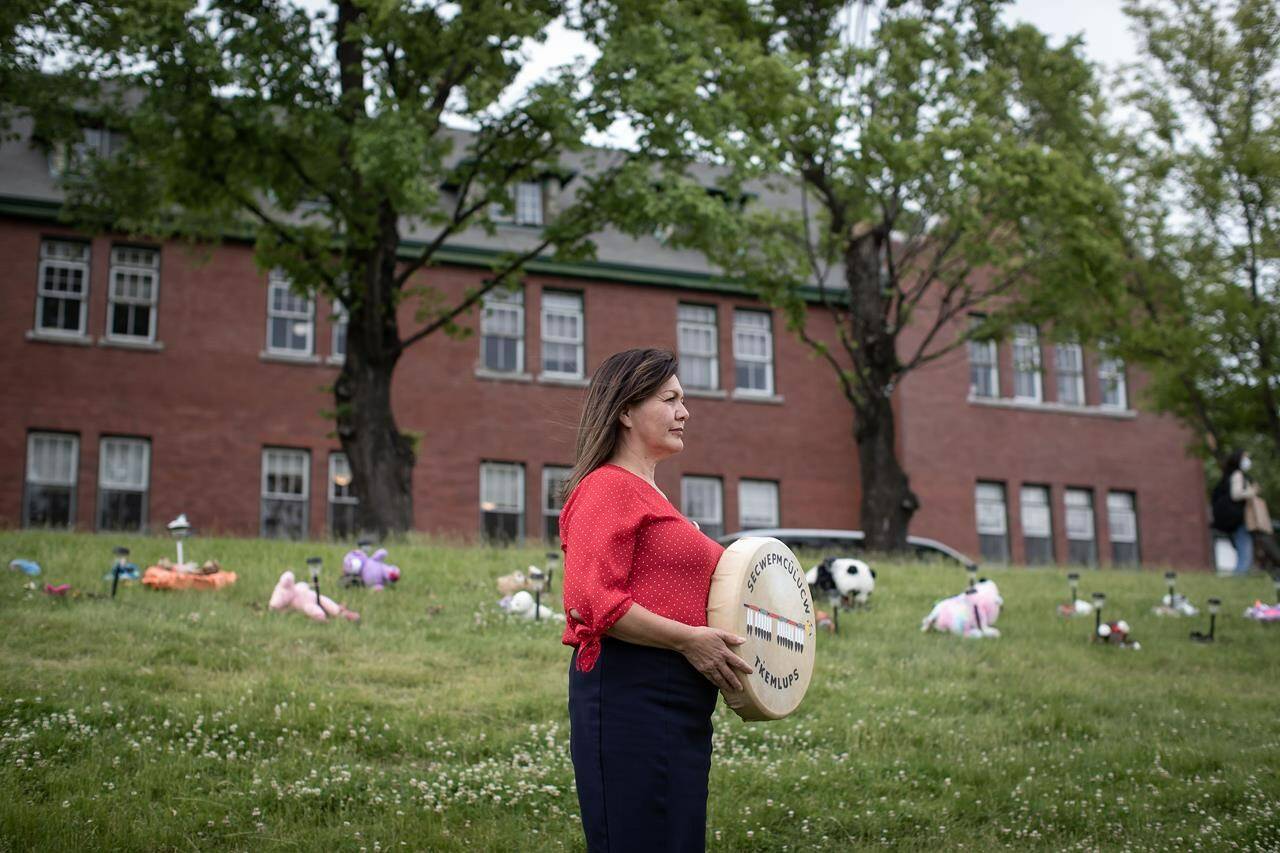 Tk’emlups te Secwepemc Chief Rosanne Casimir stands outside the former Kamloops Indian Residential School after speaking to reporters, in Kamloops, B.C., on Friday, June 4, 2021. THE CANADIAN PRESS/Darryl Dyck