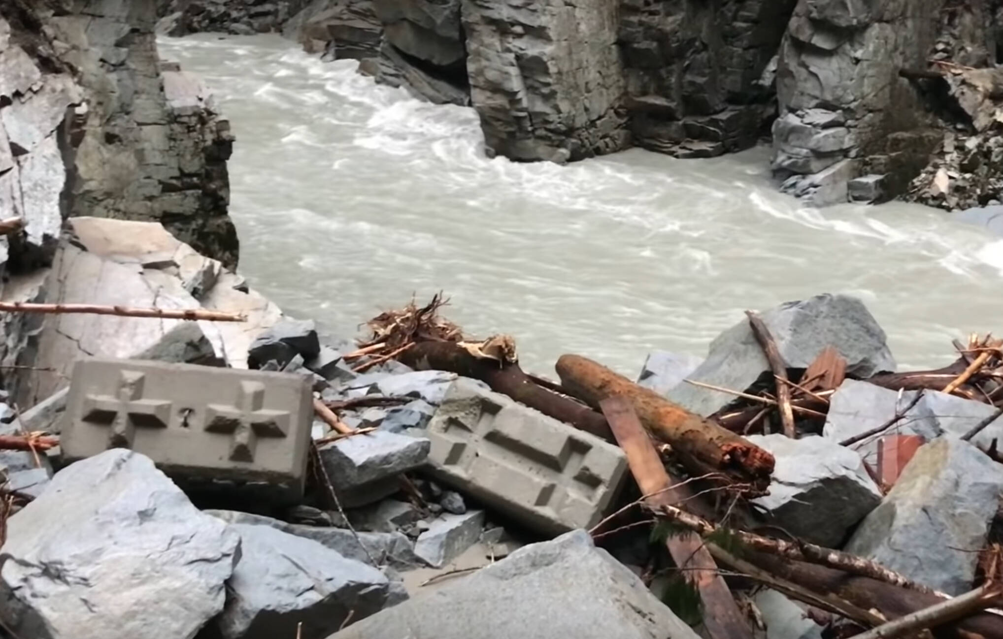 Massive cinder blocks were knocked out of place by flooding at the Othello Tunnels. (Adventures R Us YouTube screenshot)