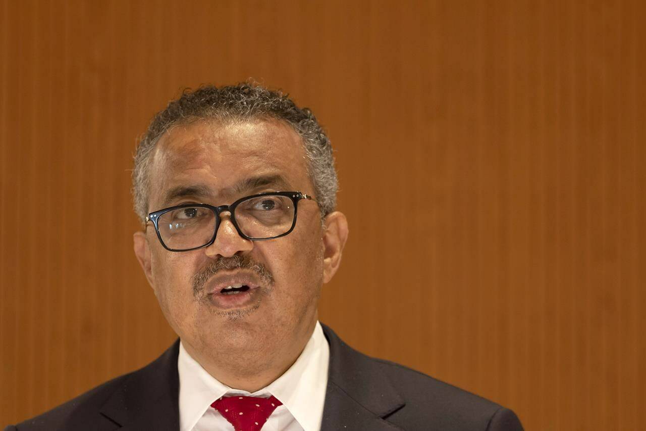 Director General of the World Health Organization (WHO) Tedros Adhanom Ghebreyesus addresses delegates during the first day of the 75th World Health Assembly at the European headquarters of the United Nations in Geneva, Switzerland, Sunday, May 22, 2022. (Salvatore Di Nolfi/Keystone via AP)