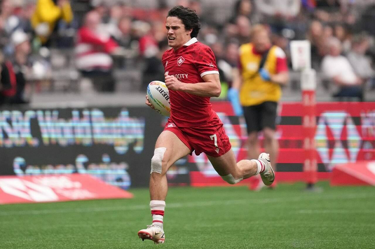 Canada’s Brock Webster runs for his second try against Scotland during HSBC Canada Sevens rugby action, in Vancouver, on Sunday, April 17, 2022. THE CANADIAN PRESS/Darryl Dyck