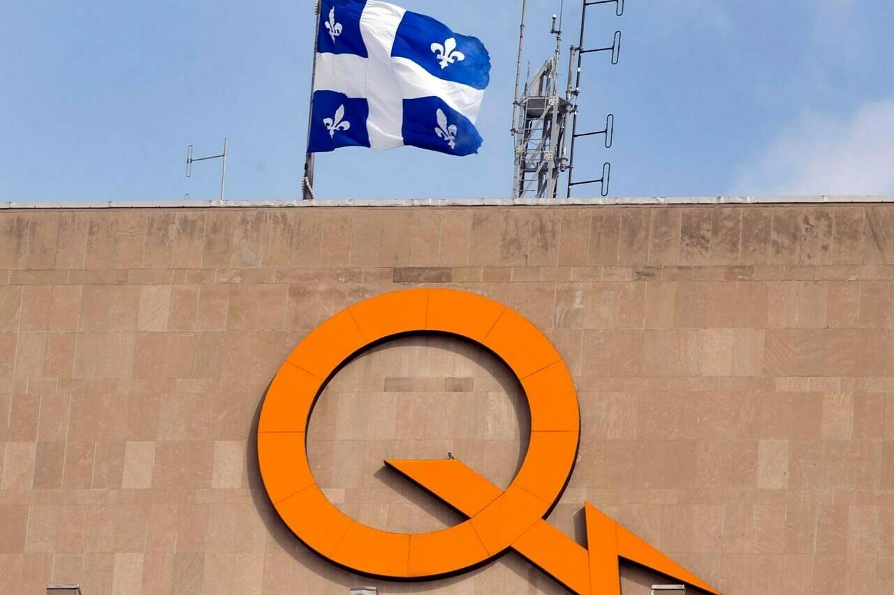 A Hydro-Québec logo is seen on their head office building in Montreal, Thursday, Feb. 26, 2015. Hydro-Québec says more than 130,000 customers are still without power after a powerful storm swept across the province on Saturday. THE CANADIAN PRESS/Ryan Remiorz