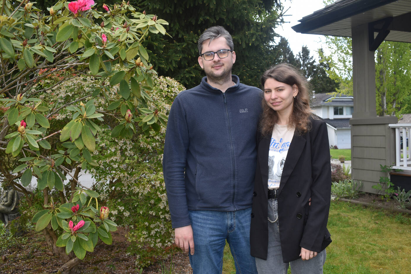Sergey Toporkov and Olena Toporkova in the garden of his uncle and aunt’s South Surrey home.