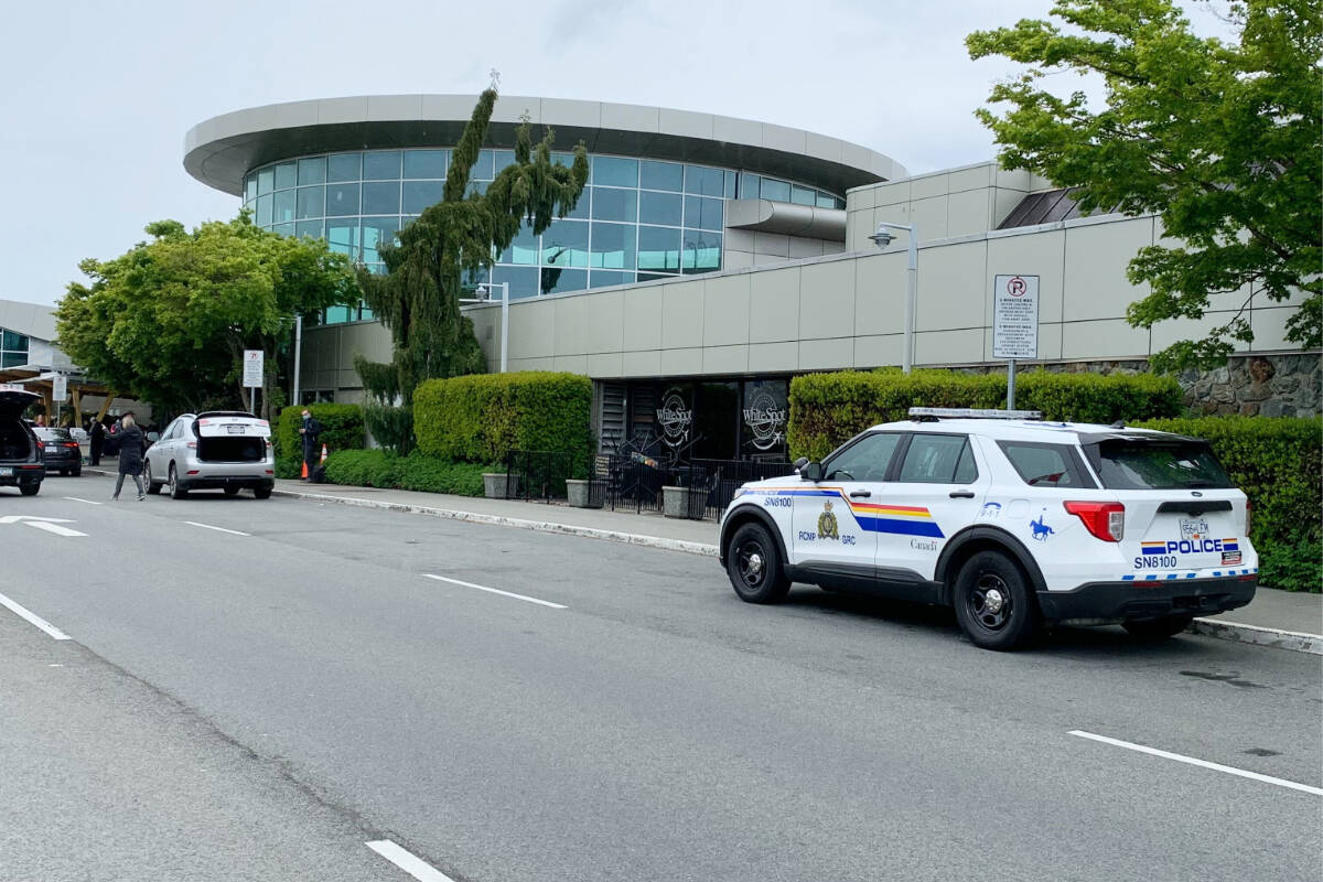 A Sidney/North Saanich RCMP police vehicle parked in front of the terminal building at Victoria International Airport. Police are clearing out passengers from the building and informing others that upcoming flights are cancelled at the present time. (Wolf Depner/News Staff)