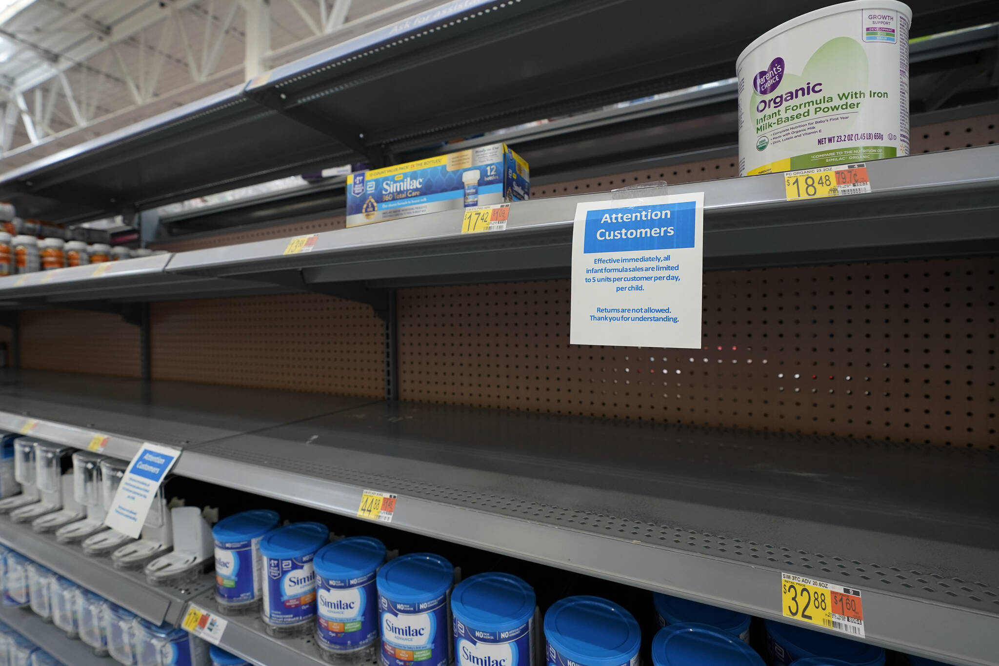 FILE - Shelves typically stocked with baby formula sit mostly empty at a store in San Antonio, Tuesday, May 10, 2022. A massive baby formula recall, combined with COVID-related supply chain problems, is getting most of the blame for the shortage that’s causing distress for many parents across the U.S. But the nation’s formula supply has long been vulnerable to this type of crisis, experts say, due to decades-old rules and policies that have allowed a handful of companies to corner nearly the entire U.S. market. (AP Photo/Eric Gay, File)