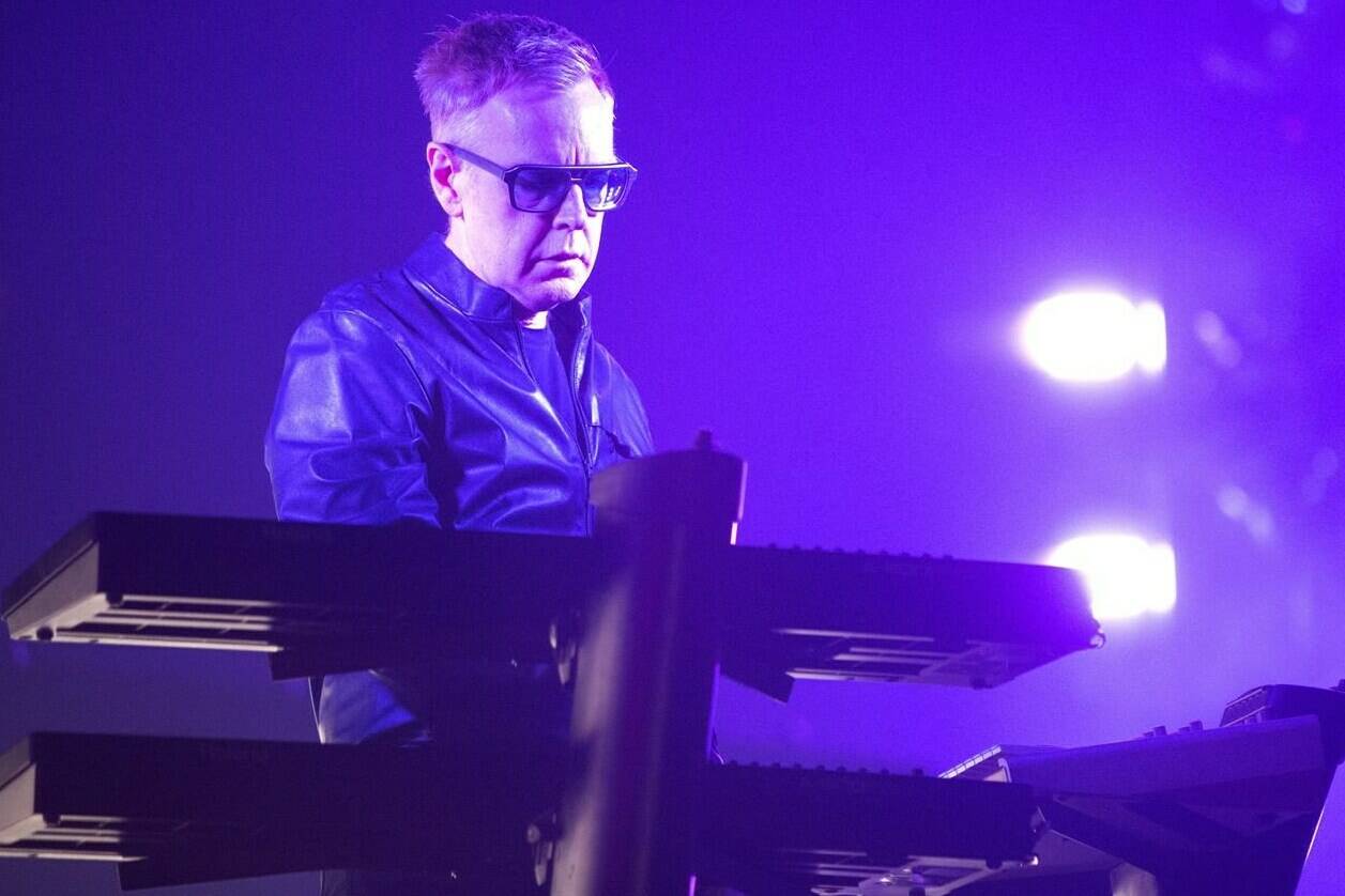 FILE - Andy Fletcher of the band Depeche Mode performs in concert during their “Global Spirit Tour” at the Capital One Arena, Sept. 7, 2017, in Washington, D.C. Fletcher, keyboardist for British synth pop giants Depeche Mode for more than 40 years has died at age 60. Depeche Mode announced the death of founding member Fletcher on its official social media pages. A person close to the band said Fletcher died Thursday, May 26, 2022, from natural causes at his home in the U.K. The person spoke on condition of anonymity because they were not authorized to speak publicly. (Photo by Owen Sweeney/Invision/AP, File)