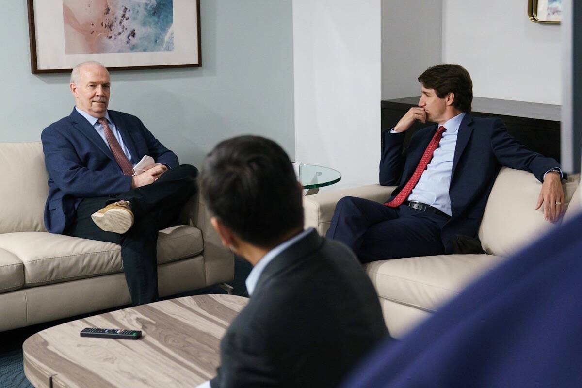 B.C. Premier John Horgan meets with Prime Minister Justin Trudeau and federal officials in Vancouver for an announcement on hosting the 2025 Invictus Games, May 24, 2022. Horgan and other premiers have been calling for a larger federal share of health care funding. (B.C. government photo)