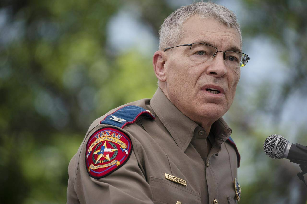 Texas Department of Public Safety Director Steven McCraw speaks during a press conference held outside Robb Elementary School on Friday, May 27, 2022, in Uvalde, Texas. Nearly 20 officers stood in a hallway outside of the classrooms during this week’s attack on a Texas elementary school for more than 45 minutes before agents used a master key to open a door and confront a gunman, authorities said Friday. (AP Photo/Wong Maye-E)