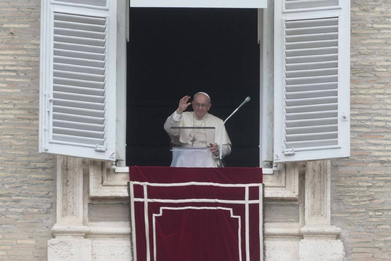 Pope Francis delivers the Regina Coeli noon prayer from his studio window overlooking St. Peter’s Square at the Vatican, Sunday, 29, 2002. (AP Photo/Gregorio Borgia)