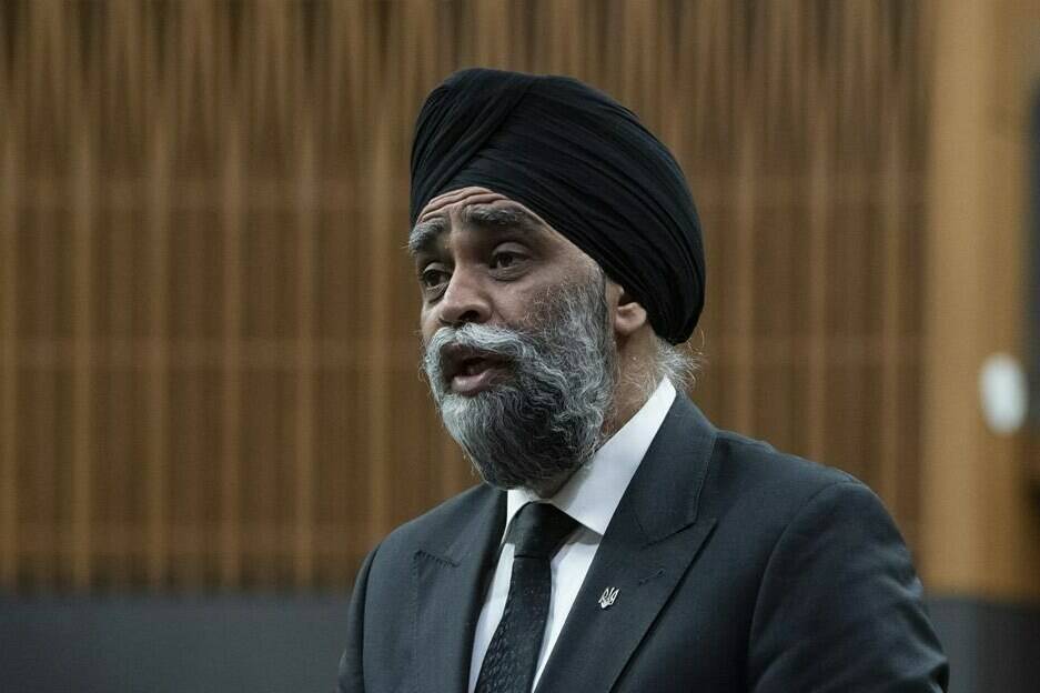 International Development Minister and Pacific Economic Development Agency of Canada Minister Harjit Sajjan rises during Question Period, in Ottawa, Monday, April 4, 2022. Sajjan says he told Canadian officials in Ukraine and neighbouring countries to ensure that women sexually assaulted by Russian troops get the help they need — including access to abortions if they wish. THE CANADIAN PRESS/Adrian Wyld