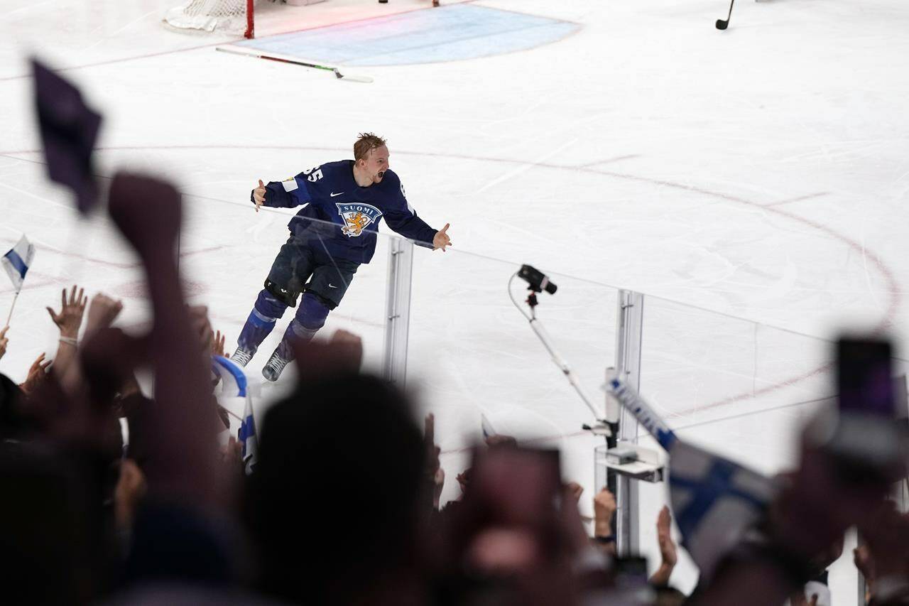 Finland’s Sakari Manninen reacts to his game-winning goal during the Hockey World Championship final match between Finland and Canada, Sunday May 29, 2022, in Tampere, Finland. Finland won 4-3 in overtime. THE CANADIAN PRESS/AP/Martin Meissner