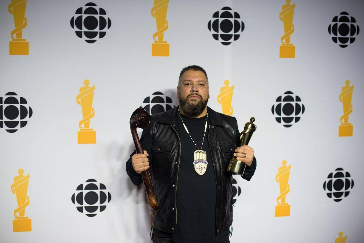 DJ Shub poses for a photograph at the media wall after winning contemporary Indigenous artist of the year during the 2022 Juno Awards Broadcast at the Budweiser Stage in Toronto, on Sunday, May 15, 2022. THE CANADIAN PRESS/ Tijana Martin