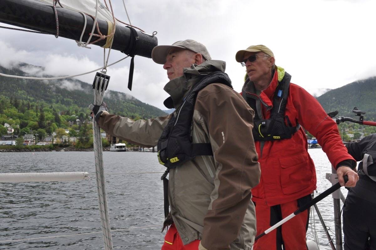 Doug Kennedy (left) and Roger Hassol keep an eye out for dangers during a practice session on Kootenay Lake. Photo: Tyler Harper