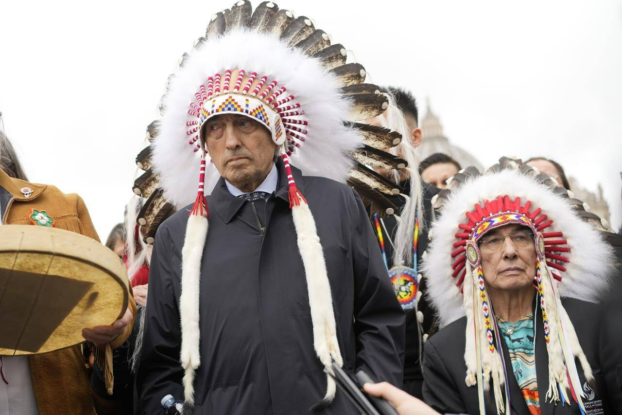 Assembly of First Nations former chief Phil Fontaine, center, stands outside St. Peter’s Square at the end of a meeting with Pope Francis at the Vatican, Thursday, March 31, 2022. Residential school survivors met with Roman Catholic bishops today to discuss what they expect from Pope Francis’ visit to Canada next month.THE CANADIAN PRESS/AP-Andrew Medichini