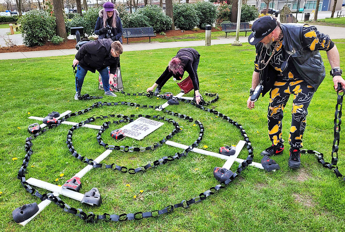 Moms stop the Harm create a mandala in Maple Ridge’s Memorial Peace Park on the sixth anniversary of the overdose public health emergency. (Neil Corbett/The News)