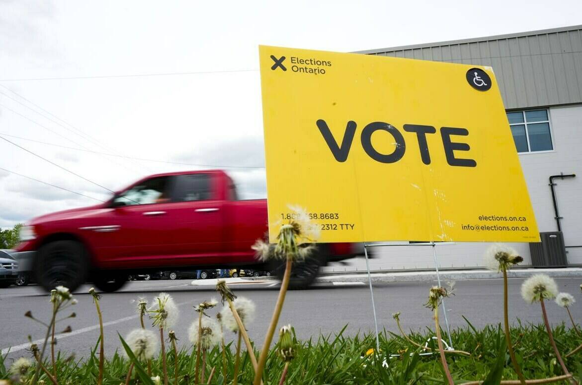 A vote sign is displayed outside a polling station during advanced voting in the Ontario provincial election in Carleton Place, Ont., on Tuesday, May 24, 2022. THE CANADIAN PRESS/Sean Kilpatrick