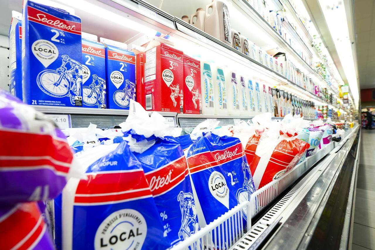 Milk and dairy products are displayed for sale at a grocery store in Aylmer, Que., on Thursday, May 26, 2022. Dairy Farmers of Canada has asked the Canadian Dairy Commission for a mid-year milk price hike due to the current inflationary environment. THE CANADIAN PRESS/Sean Kilpatrick