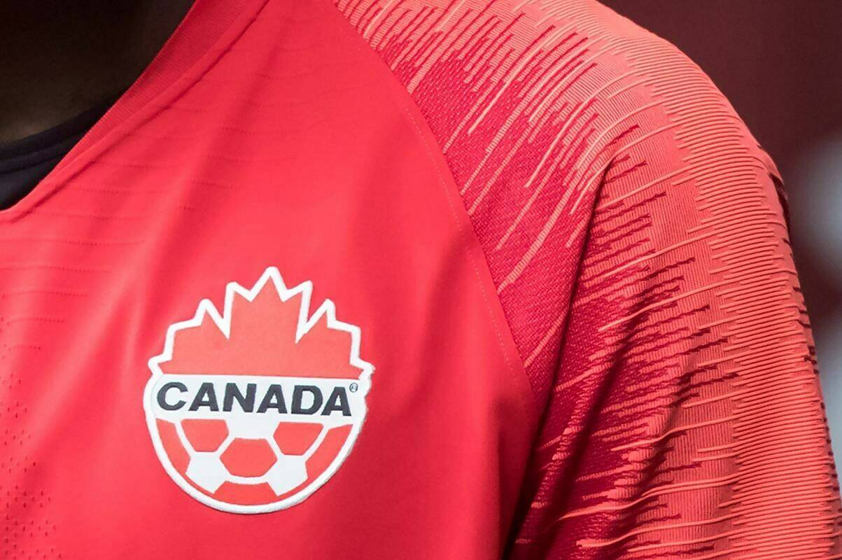 A Canada soccer logo is seen on Alphonso Davies in Vancouver, B.C., Sunday, March 24, 2019. A planned training session for Canada’s men’s soccer team was scrapped Friday amid ongoing discussions about player compensation. THE CANADIAN PRESS/Darryl Dyck