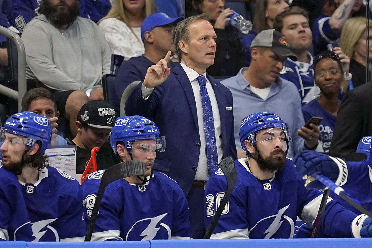 Tampa Bay Lightning head coach Jon Cooper directs players on the ice during the second period in Game 4 of the NHL Hockey Stanley Cup playoffs Eastern Conference finals against the New York Rangers, Tuesday, June 7, 2022, in Tampa, Fla. (AP Photo/Chris O’Meara)