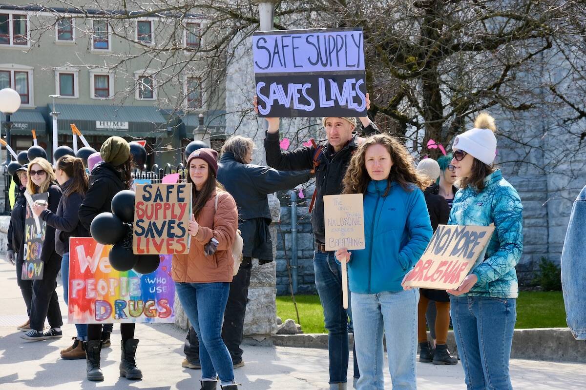 Advocates for decriminalization and safe supply of drugs stood outside Nelson’s city hall on April 14th. In the month of April, 161 British Columbians died from the toxic drug supply, according to the BC Coroners Service. (Bill Metcalfe/News Staff)