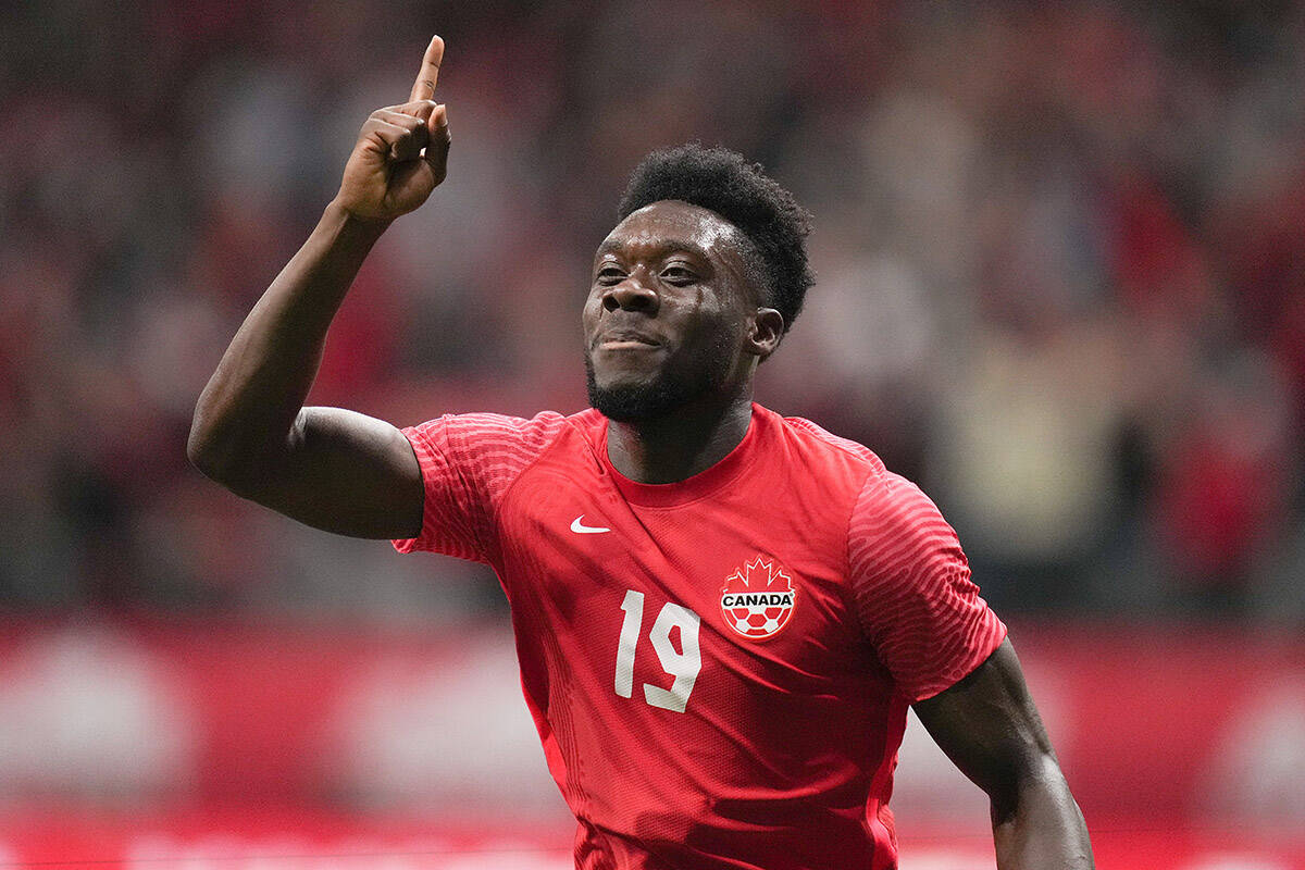 Canada’s Alphonso Davies celebrates his penalty kick goal against Curacao during the first half of a CONCACAF Nations League soccer match, in Vancouver, on Thursday, June 9, 2022. THE CANADIAN PRESS/Darryl Dyck