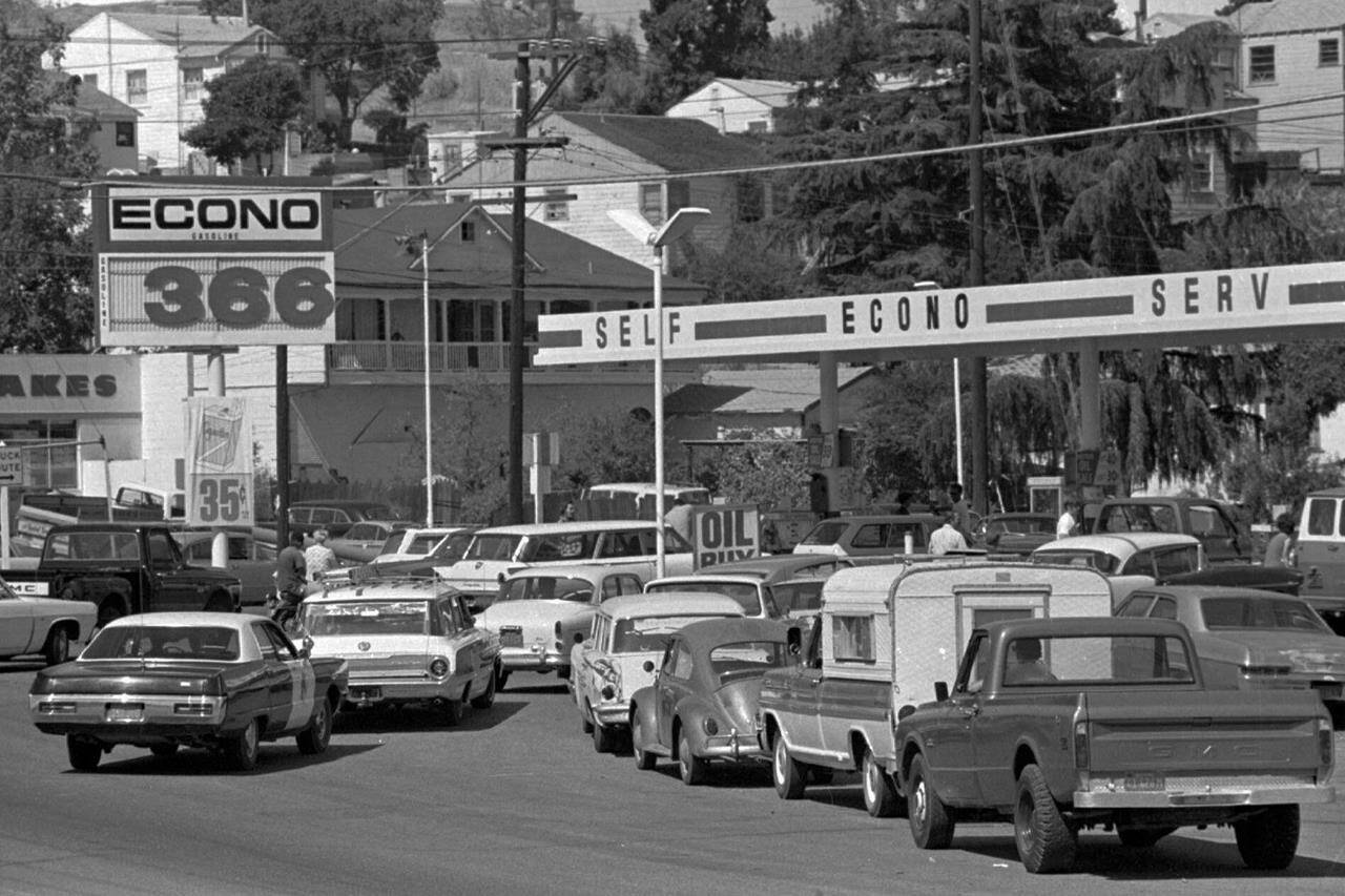 FILE - Cars line up for gas at a gas station in Martinez, Calif., on Sept. 21, 1973. An unhappy confluence of events has economists reaching back to the days of disco and the bleak high-inflation, high-unemployment economy of nearly a half century ago. No one thinks stagflation is in sight. But as a longer-term threat, it can no longer be dismissed.(AP Photo/File)