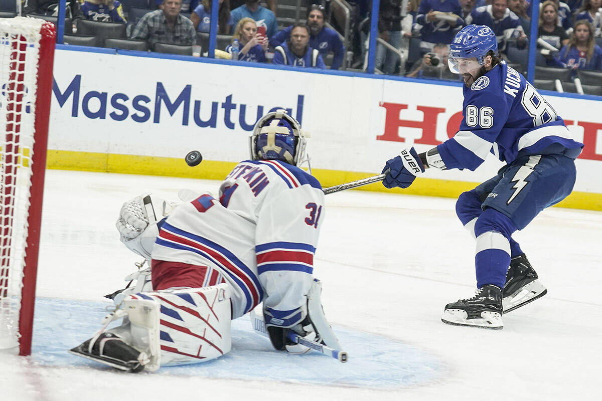 New York Rangers goaltender Igor Shesterkin (31) makes the save against Tampa Bay Lightning right wing Nikita Kucherov (86) during the second period in Game 6 of the NHL hockey Stanley Cup playoffs Eastern Conference finals, Saturday, June 11, 2022, in Tampa, Fla. (AP Photo/Chris O’Meara)