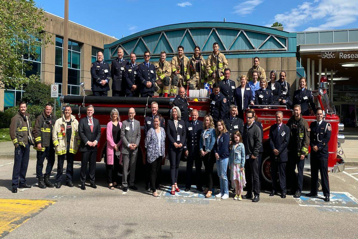Group of members of the B.C. Professional Fire Fighters’, B.C. Children’s Hospital staff, and the McKenzies’ a patient family joining together in front of the hospital (June 14). Provided by B.C. Children’s Hospital.