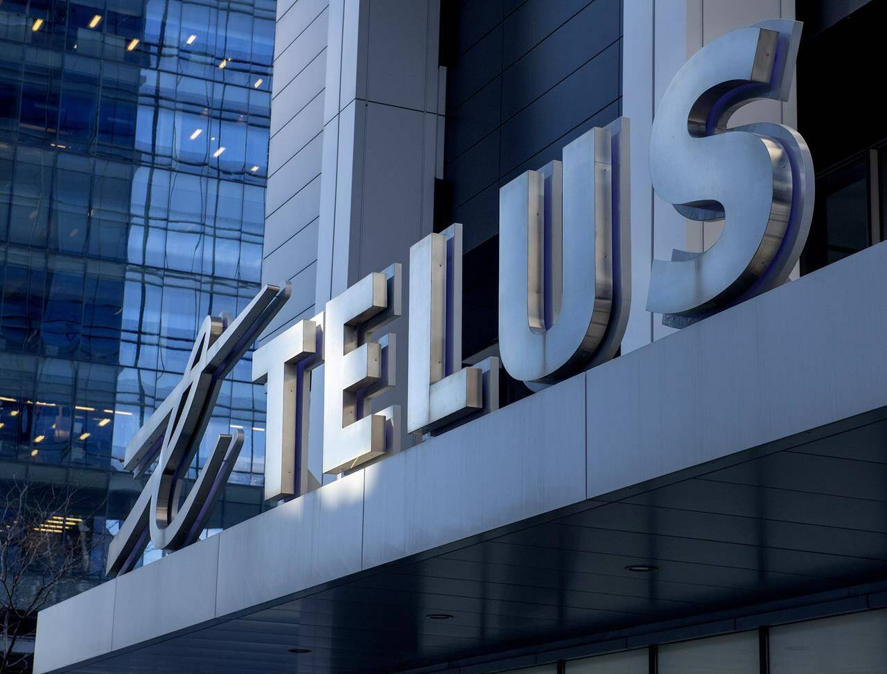 The sign on the front of the Telus head office is shown in Toronto on Thursday, February 11, 2021. Telus Corp. has signed a deal to buy LifeWorks Inc. valued at $2.9 billion including debt. THE CANADIAN PRESS/Frank Gunn