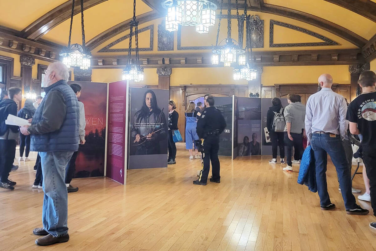 Visitors at the Sixties Scoop exhibit during its stop at the Cranbrook History Centre on May 11, 2022. (Photo credit: Sixties Scoop Indigenous Society of Alberta)