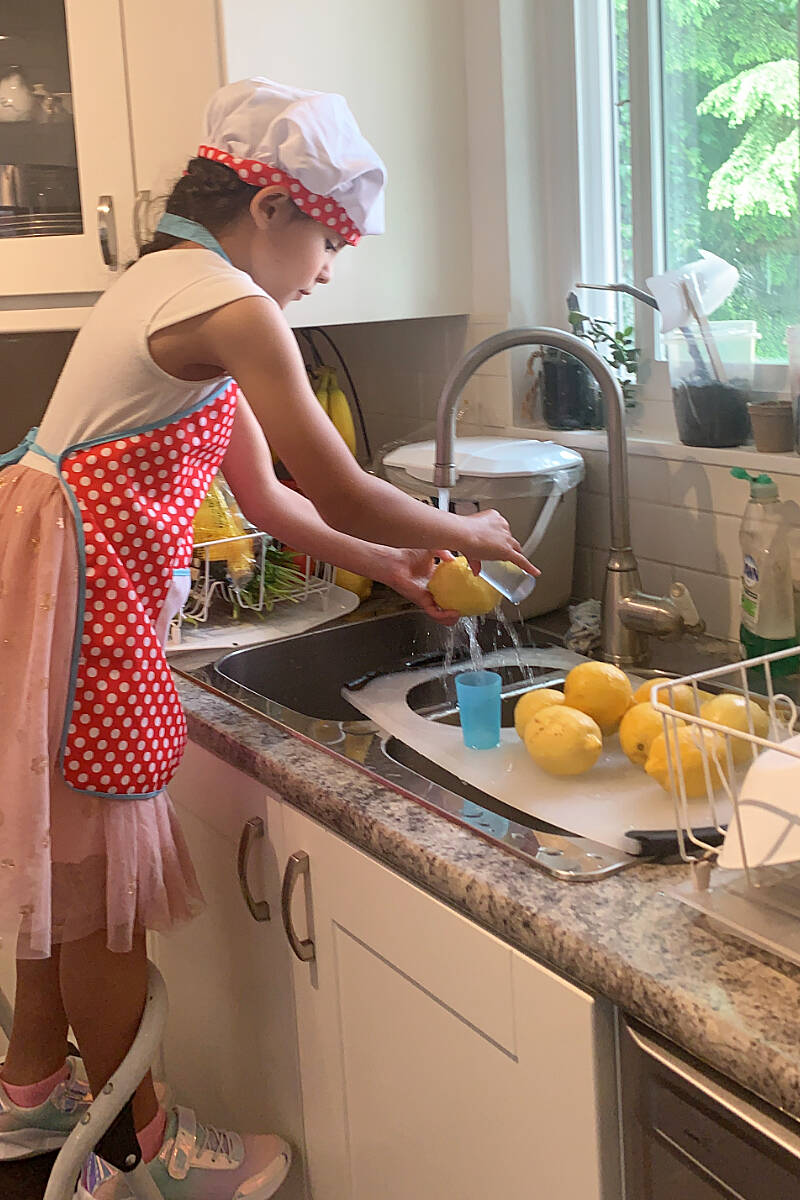 Elizabeth Denes Luque, 6, makes her lemonade from scratch. (Special to The News)