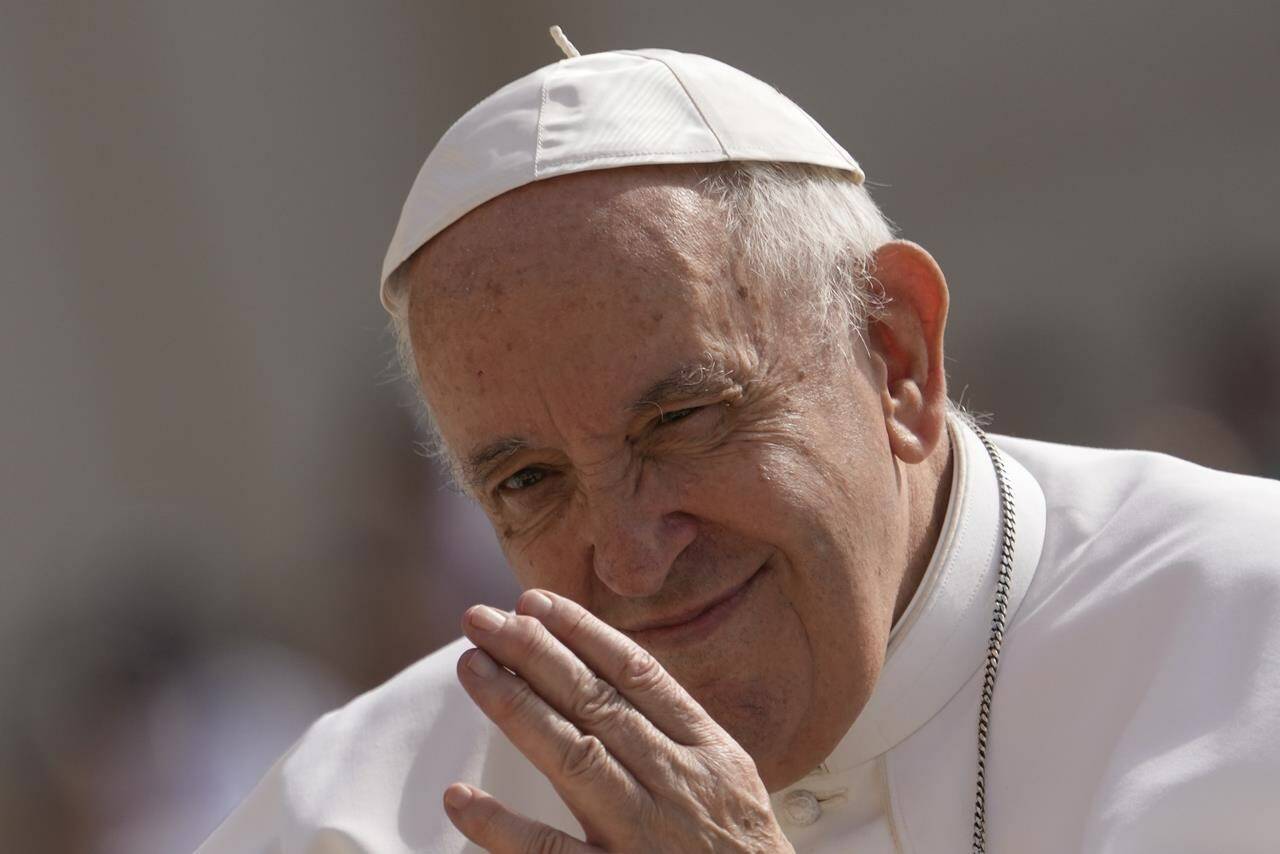 Pope Francis arrives to attend his weekly general audience in St. Peter’s Square at the Vatican, Wednesday, June 22, 2022. The Vatican has released the program for Pope Francis’ visit to Canada next month, which includes a visit to the site of a former residential school in Alberta with survivors of the institutions.(AP Photo/Andrew Medichini)