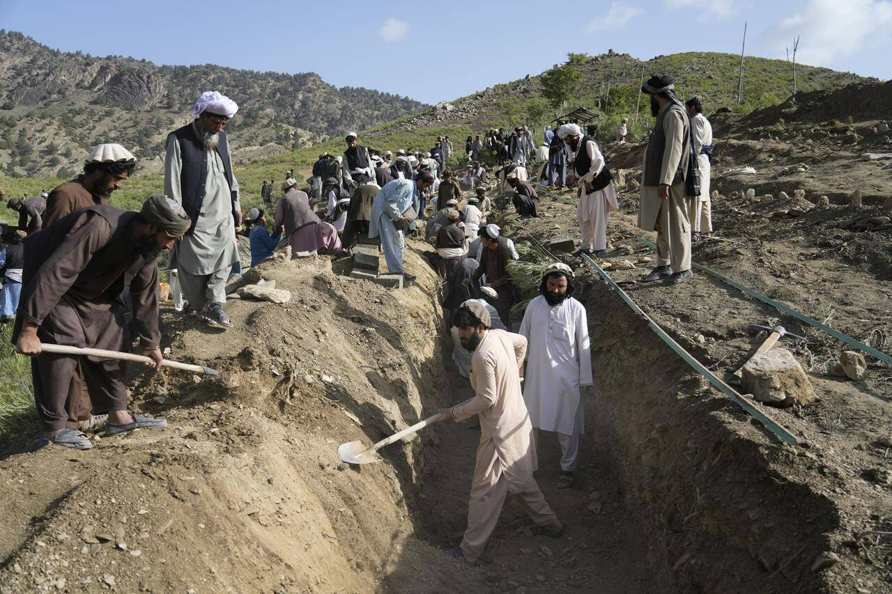 Afghans dig a trench for a common grave for their relatives killed in an earthquake to a buria site l in Gayan village, in Paktika province, Afghanistan, Thursday, June 23, 2022. Some Afghan-Canadians say they are worried Wednesday’s magnitude 6 earthquake in eastern Afghanistan could heighten the country’s already dire humanitarian crisis. THE CANADIAN PRESS/AP-Ebrahim Nooroozi