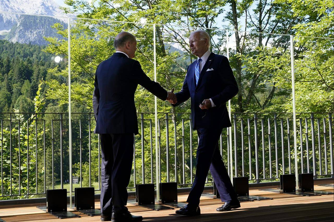 President Joe Biden and German Chancellor Olaf Scholz meet and shake hands during a bilateral meeting at the G7 Summit in Elmau, Germany, Sunday, June 26, 2022. Biden is in Germany to attend the Group of Seven summit of leaders of the world's major industrialized nations. (AP Photo/Susan Walsh)