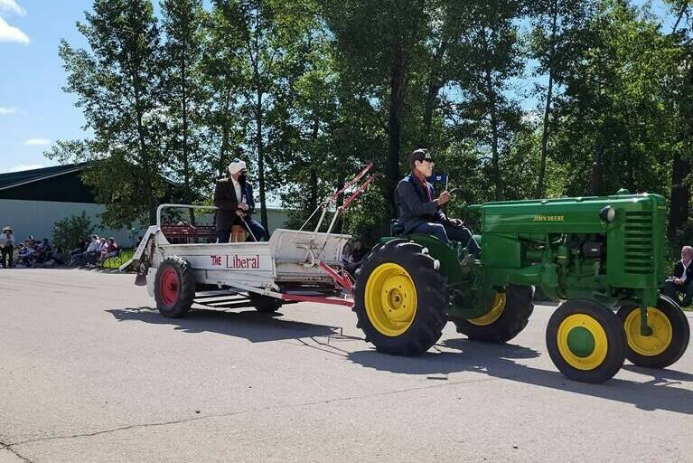 Organizers of a rodeo in Sundre, Alta., are apologizing for a parade float, seen here in a Saturday, June 25, 2022, handout photo, with a turban-wearing man in a fake beard seated on a manure spreader with the words “The Liberal” painted on the side. THE CANADIAN PRESS/HO-Mike Crampton