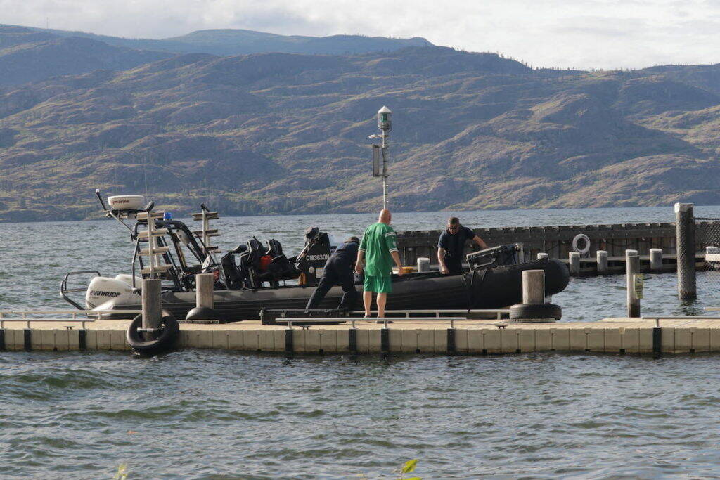 The RCMP Underwater Recovery Team prepare to launch from the Peachland Yacht Club. (Photo/Gary Barnes)