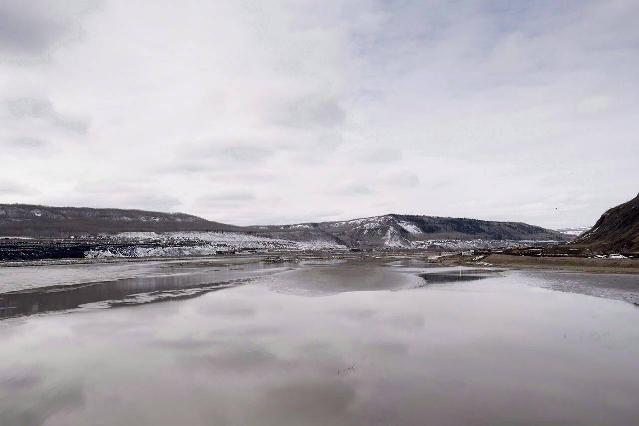 The Site C Dam location is seen along the Peace River in Fort St. John, B.C., Tuesday, April 18, 2017. An agreement has been reached with the West Moberly First Nations over a lawsuit that said the massive Site C hydroelectric dam in northeastern B.C. would destroy their territory and violate their rights. THE CANADIAN PRESS/Jonathan Hayward